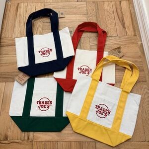 New w. tag Trader Joe’s set of 4 mini Canvas Tote Bag Red Blue Green Yellow